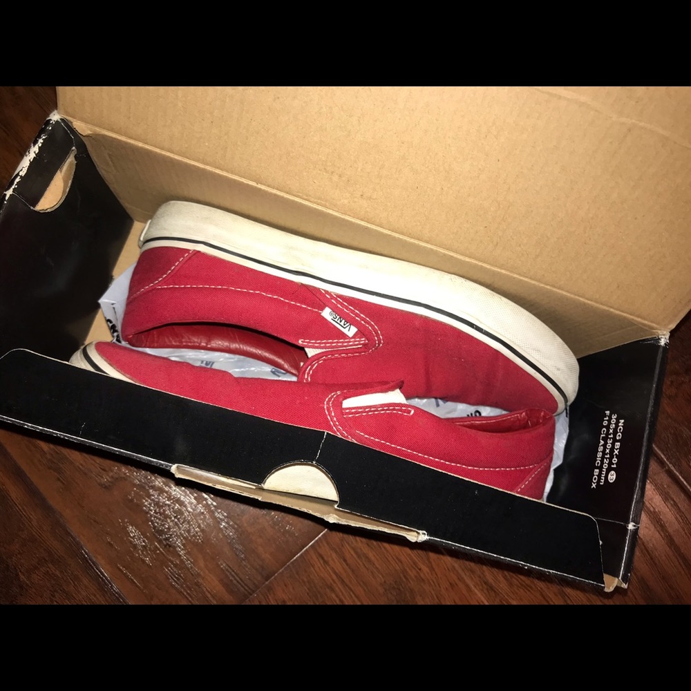 red canvas slip on vans